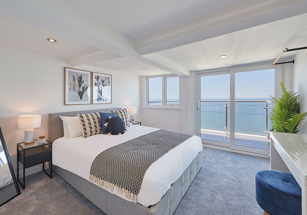 Holiday apartment bedroom with sea view