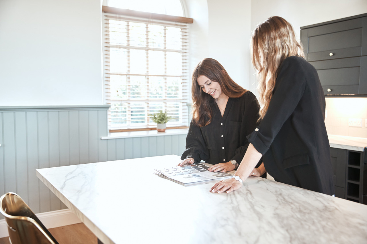 Interior Designers discussing a design